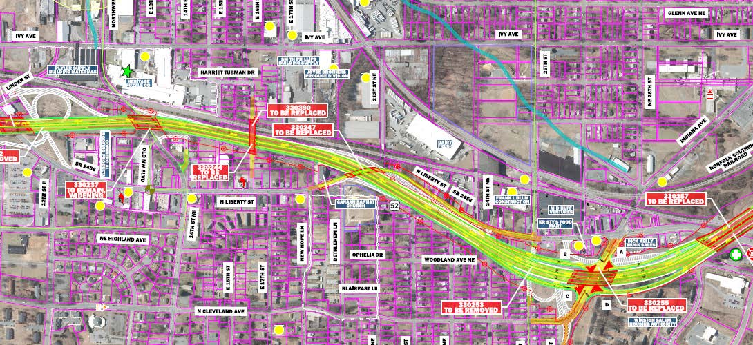 Map highlighting road changes with labels "To Be Replaced" or "To Be Removed." Various street names visible: NE Highland Ave, N Liberty St, Woodland Ave NE, E 17th St, Harrit Turnman Dr