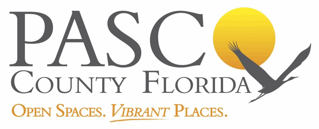 Pasco County Florida logo with sun and flying bird, text: 