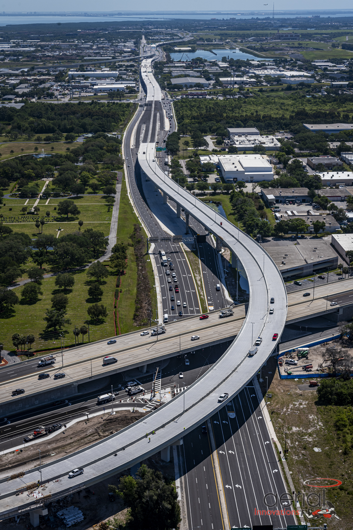 Aerial view of Pinellas Gateway Expressway with multiple lanes, greenery, and nearby buildings