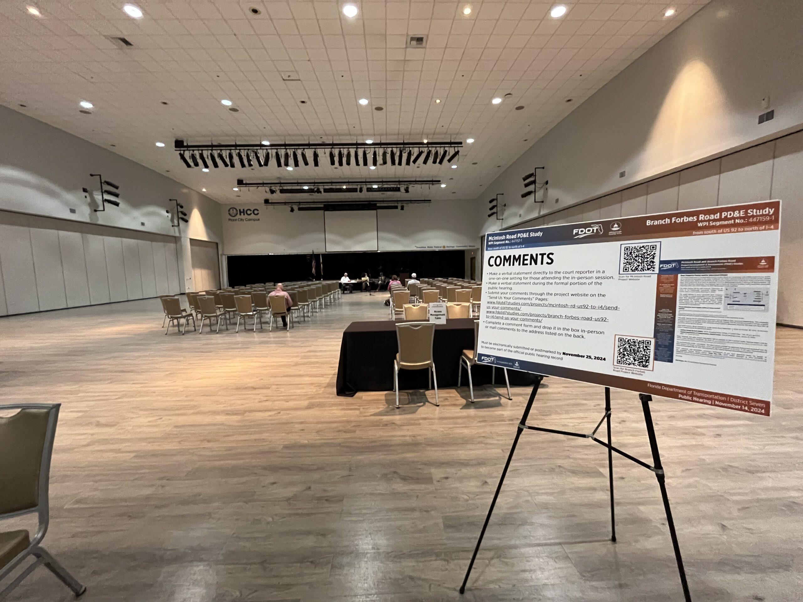 Large conference room with informational poster about Branch Forbes Road PD&E Study