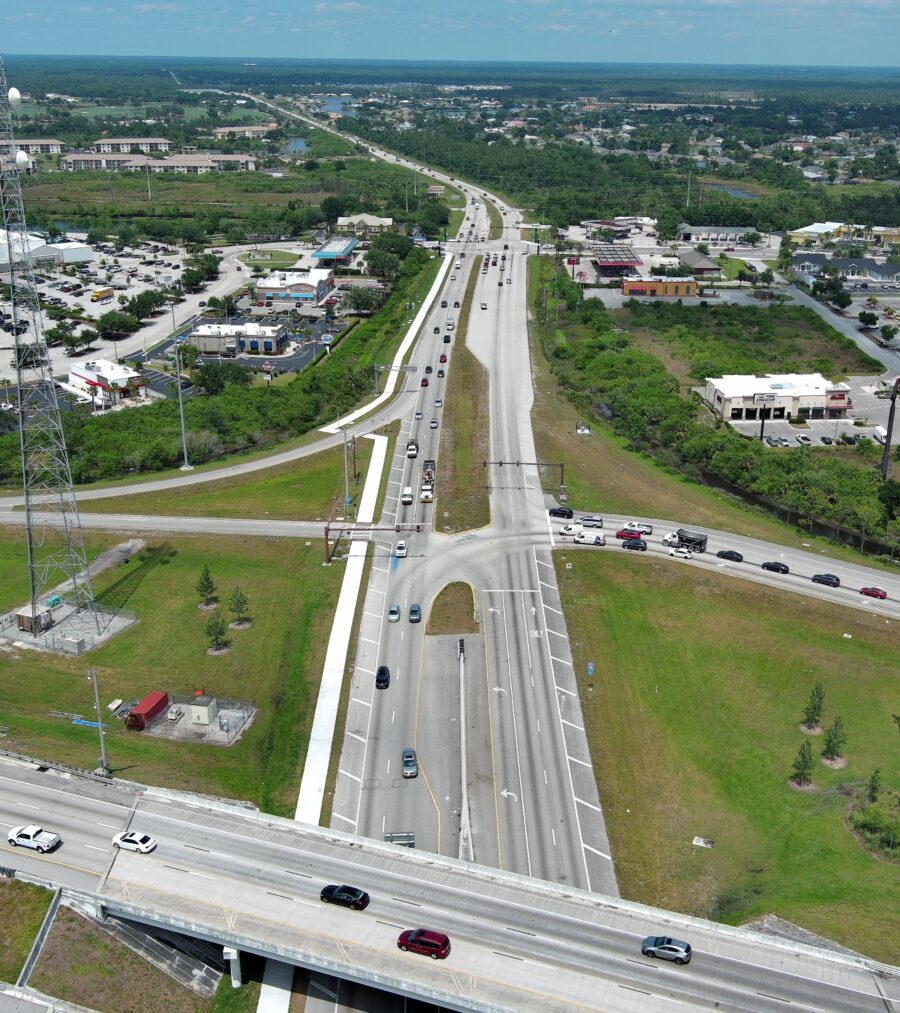 Aerial view of Kings Highway intersection with I-75, showing busy traffic and commercial areas nearby