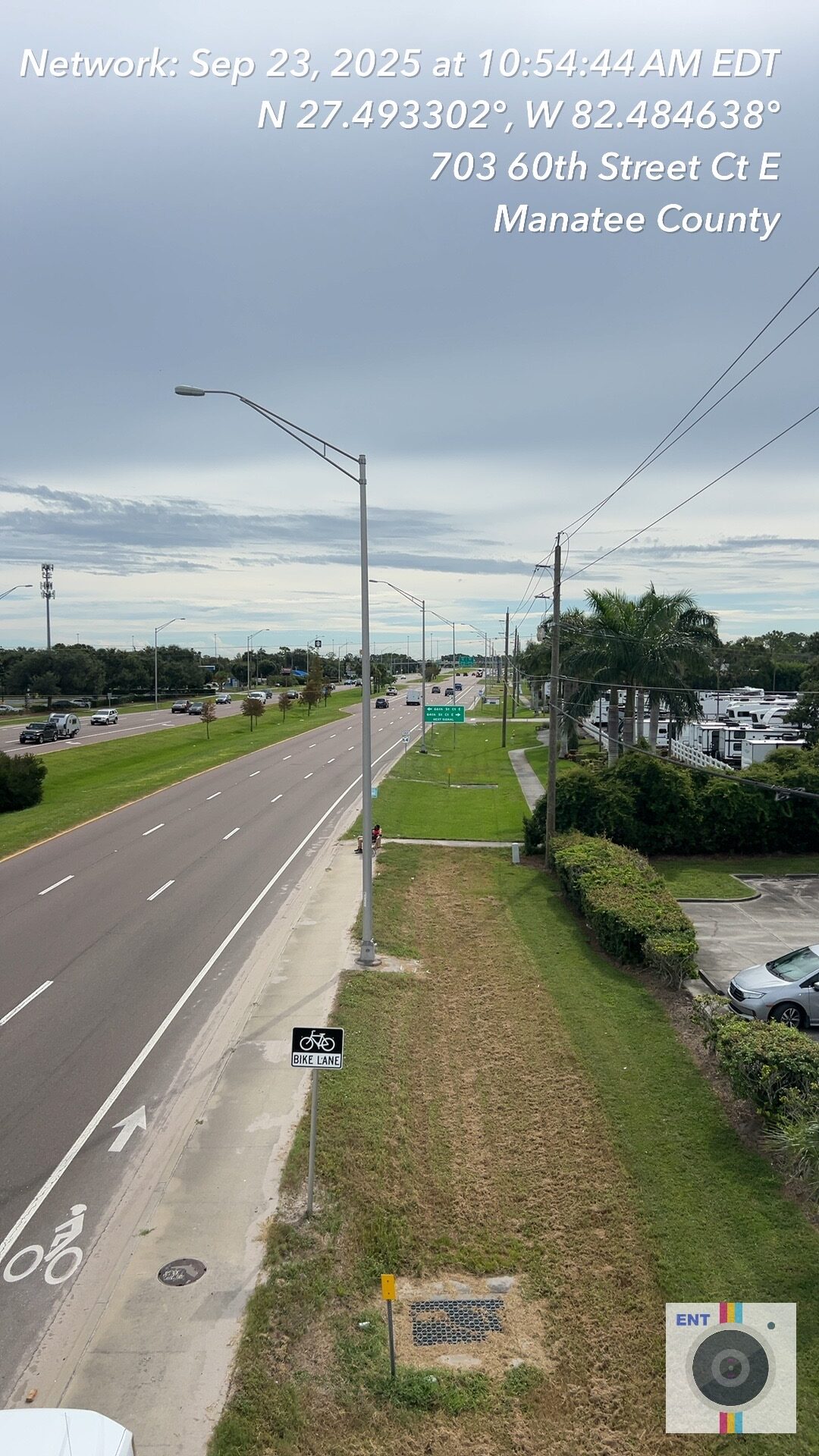 Street view with labeled coordinates, date, time; bike lane indicated