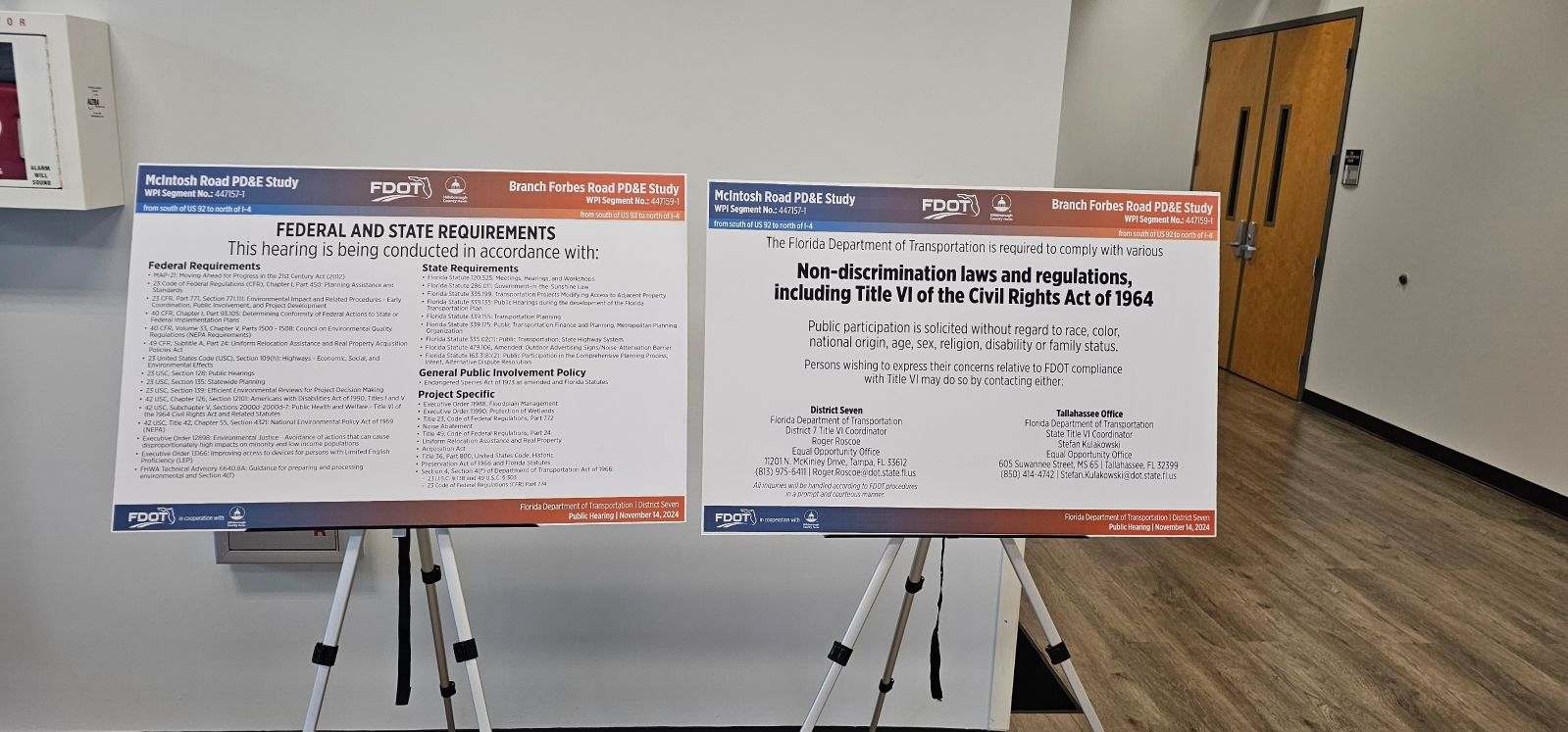 Two posters detail federal and state requirements and non-discrimination laws for a public hearing on November 14, 2024